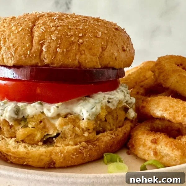 Chicken Parmesan Burger Recipe: Crispy, Cheesy Sandwiches 12 Tuna Burgers with canned tuna assembled on a plate.