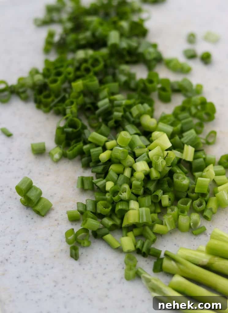 Chopped scallions on a cutting board