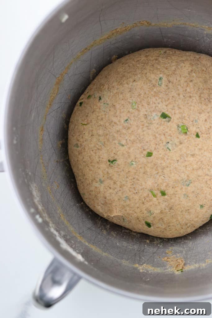 Flatbread dough in a silver bowl