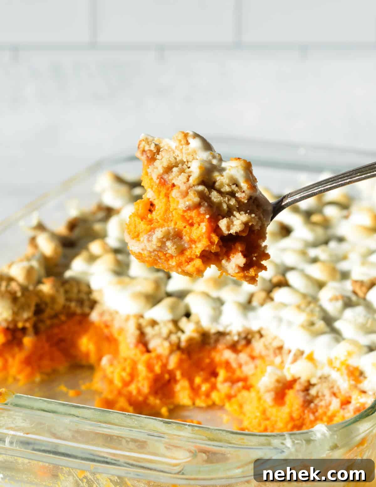 a large spoonful of sweet potato casserole.