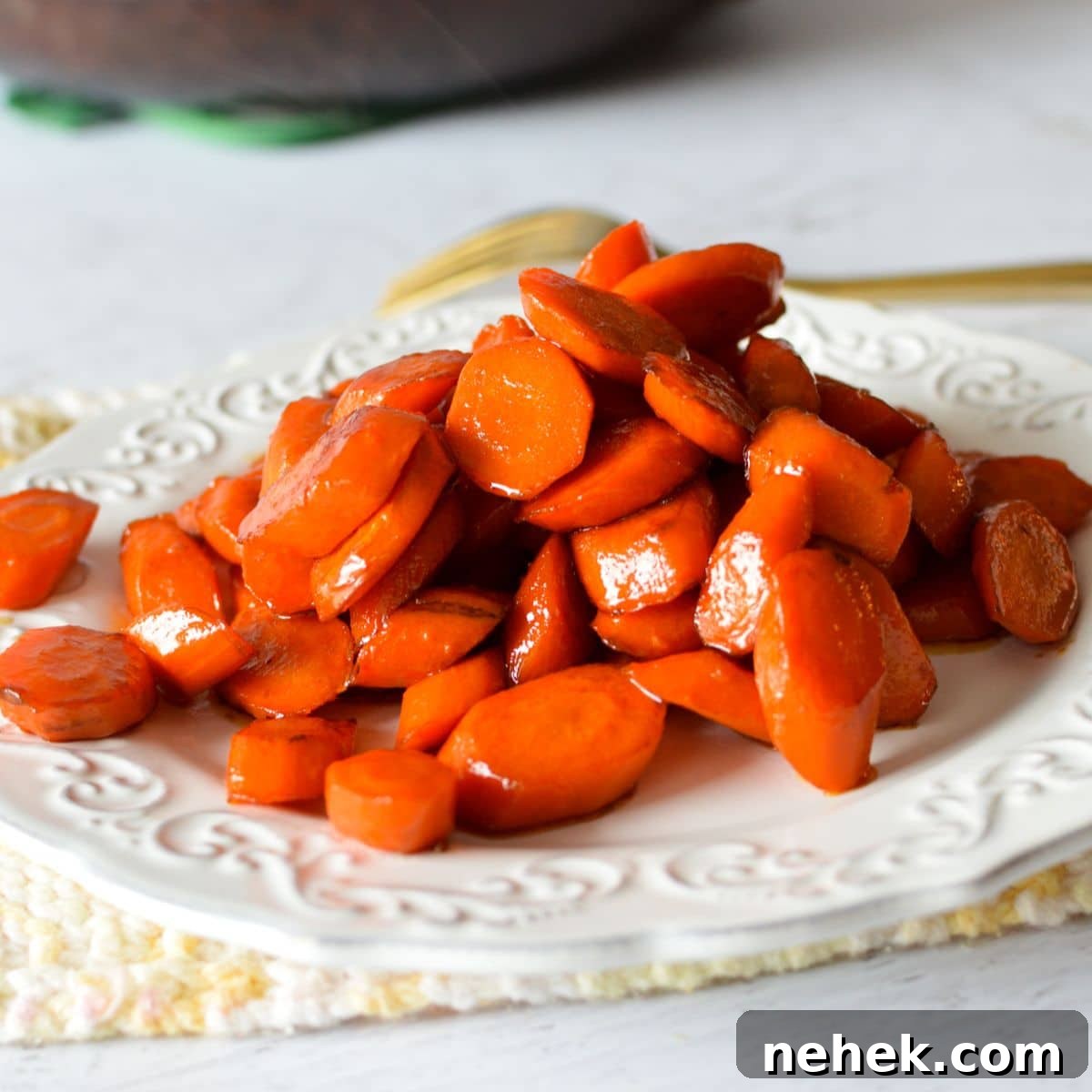 a plate of glazed carrots.