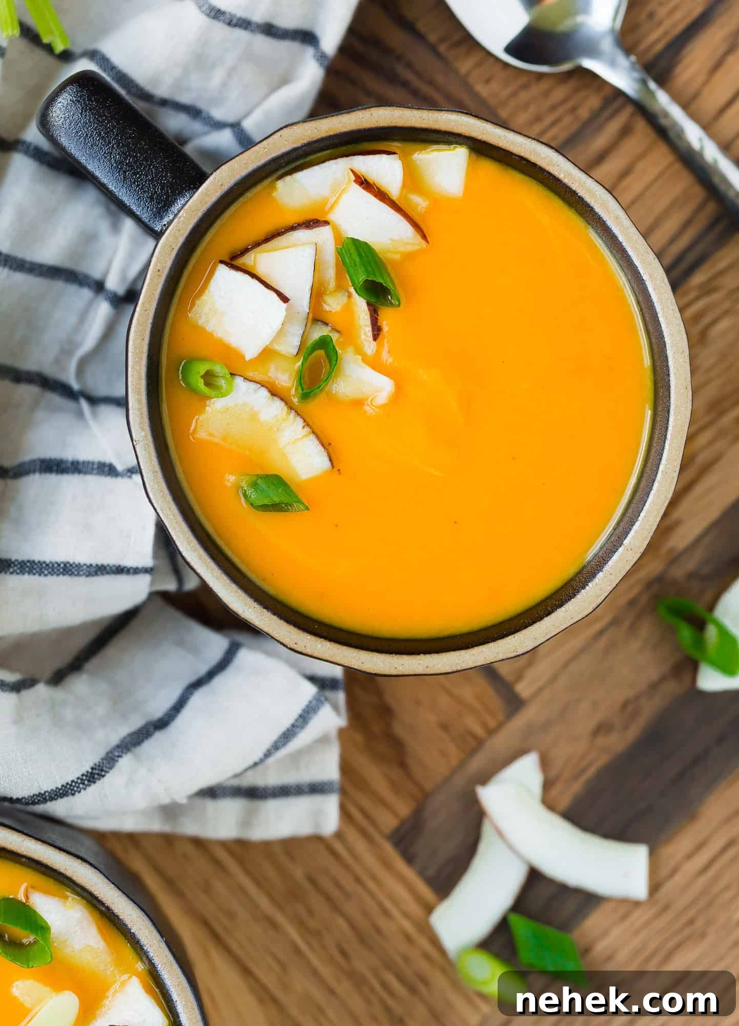 Vibrant Carrot Ginger Soup — Vegan & Whole30-Friendly Recipe 5 Close up image of creamy carrot soup.