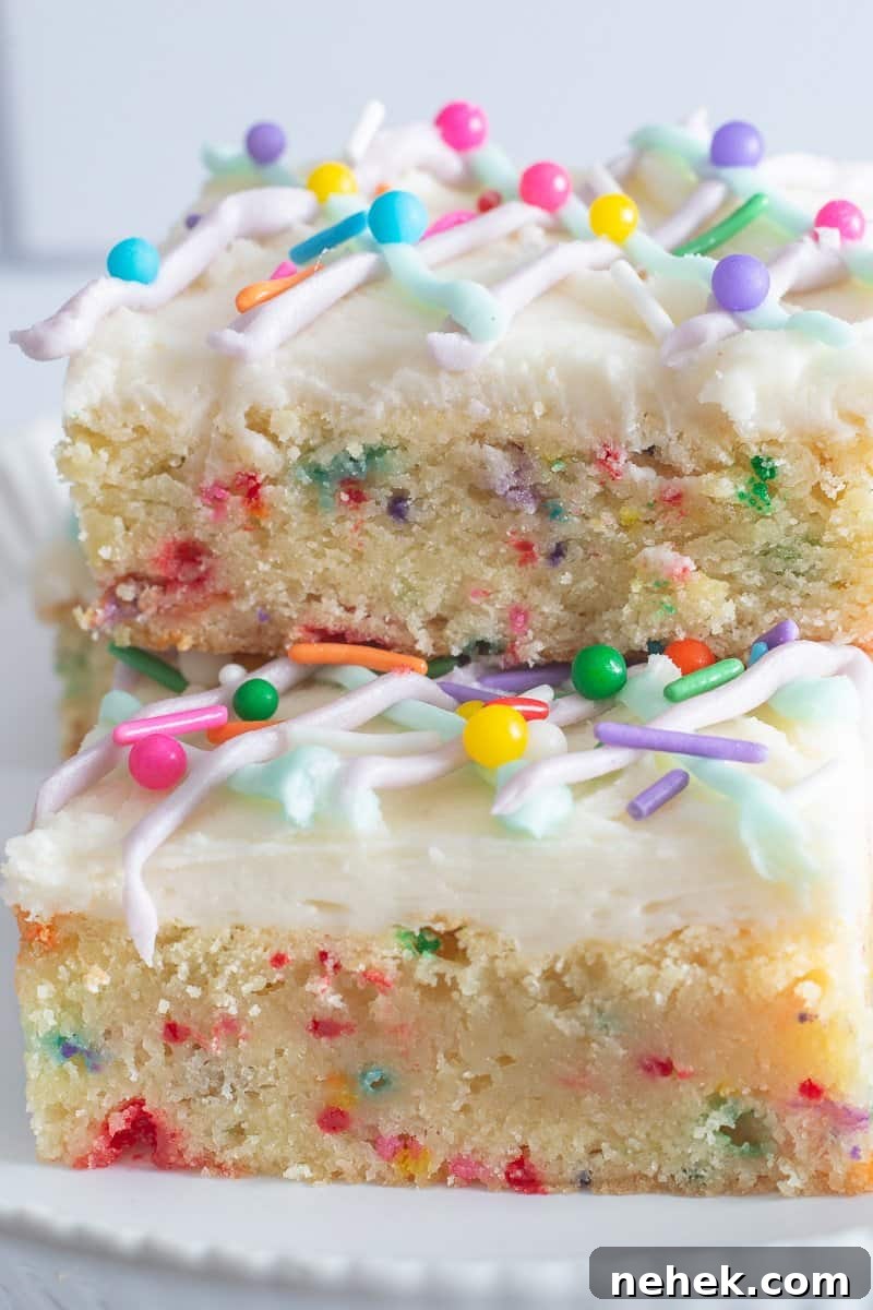 Three Unicorn Bars stacked on white plate.
