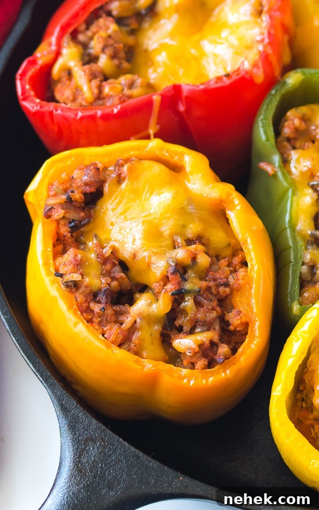 Ground Turkey Stuffed Peppers Recipe - This no-fuss stuffed peppers recipe is the perfect easy family dinner recipe. If you prefer ground beef, it's an easy swap!