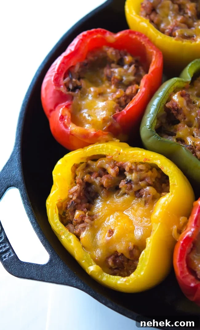 Ground Turkey Stuffed Peppers Recipe - This no-fuss stuffed peppers recipe is the perfect easy family dinner recipe. If you prefer ground beef, it's an easy swap!