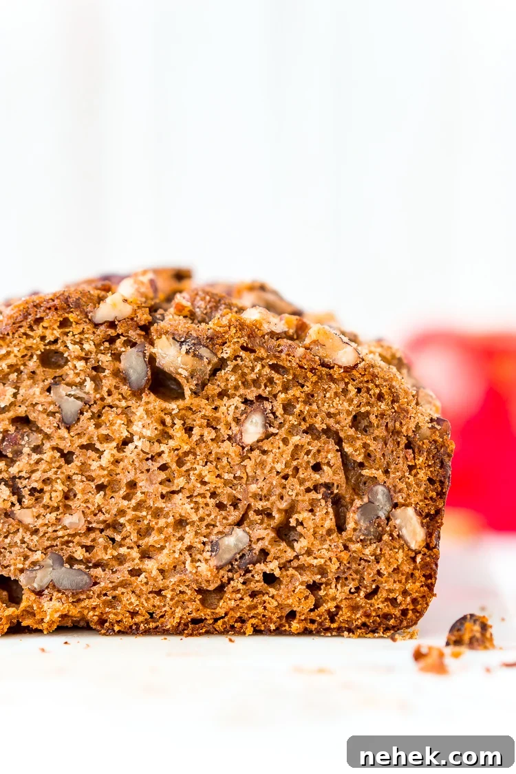 This simple Applesauce Bread is the perfect way to enjoy some of fall’s best flavors. Laced with warm spices, brown sugar, and chopped pecans, this quick bread is a delicious treat to make and share during the autumn season.