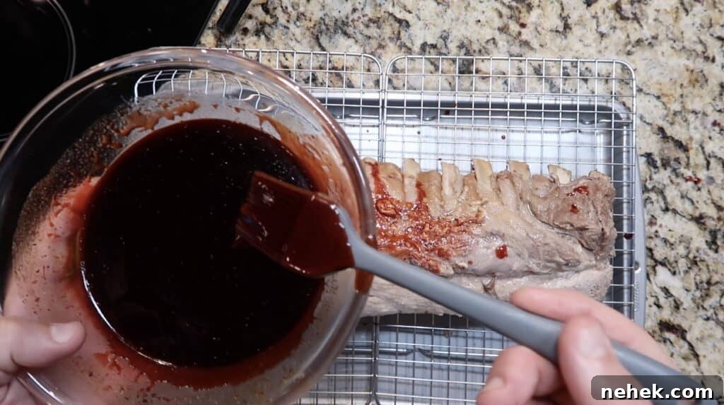 Brushing char siu sauce onto ribs