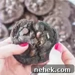 Chocolate Mint Cookies with Fudgy Chocolate Chips 7 hands breaking a chocolate mint cookie in half