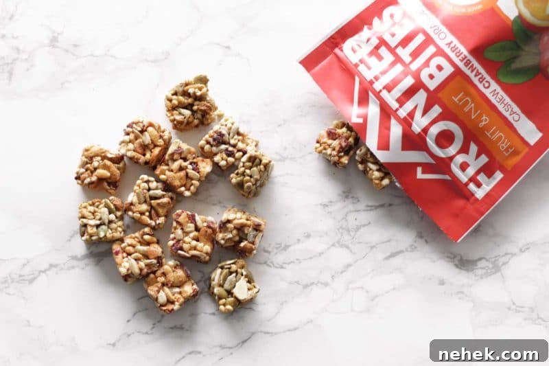 Maple Vanilla Baked Pears with Crunchy Granola Topping 5 15 Frontier Bite Granola Clusters lying on a white marble table.