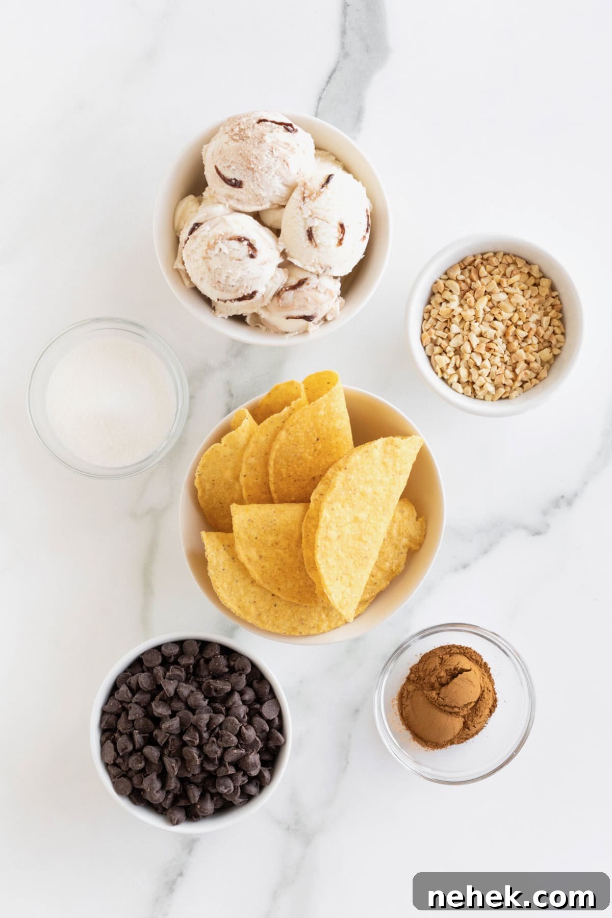 How to Make Homemade Chocolate Tacos: Step-by-Step Recipe 5 Ingredients to make chaco tacos in small glass dishes on a white marble counter.