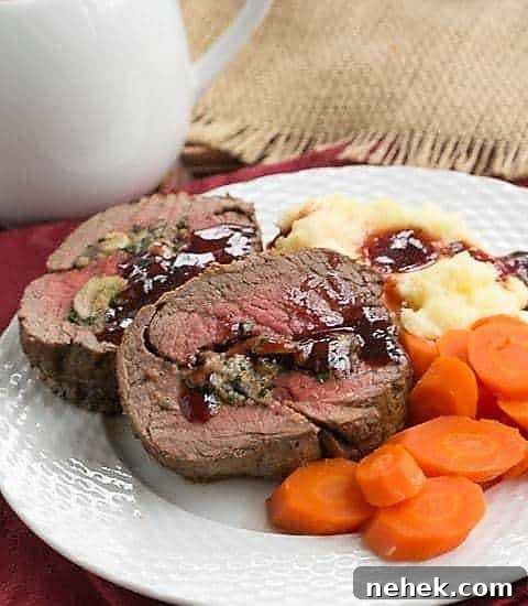 Gorgonzola Mushroom Stuffed Beef Tenderloin from That Skinny Chick Can Bake; Collection of 60 Amazing Recipes for Your Holiday Dinners compiled by Jane Bonacci, The Heritage Cook.