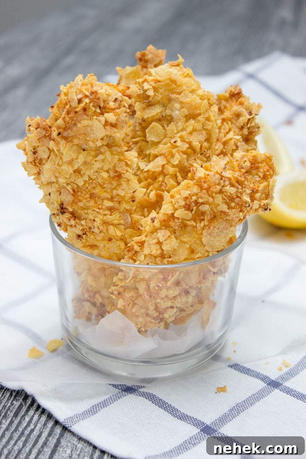 Crispy Baked Cornflake Chicken Tenders You’ll Love 3 Crispy Baked Cornflake Chicken Tenders made without added fat are the perfect low-calorie, quick and HEALTHY family meal. Served with homemade Honey Dijon Sauce, these tenders are delicious gameday finger food too. CLICK to read more or PIN for later!