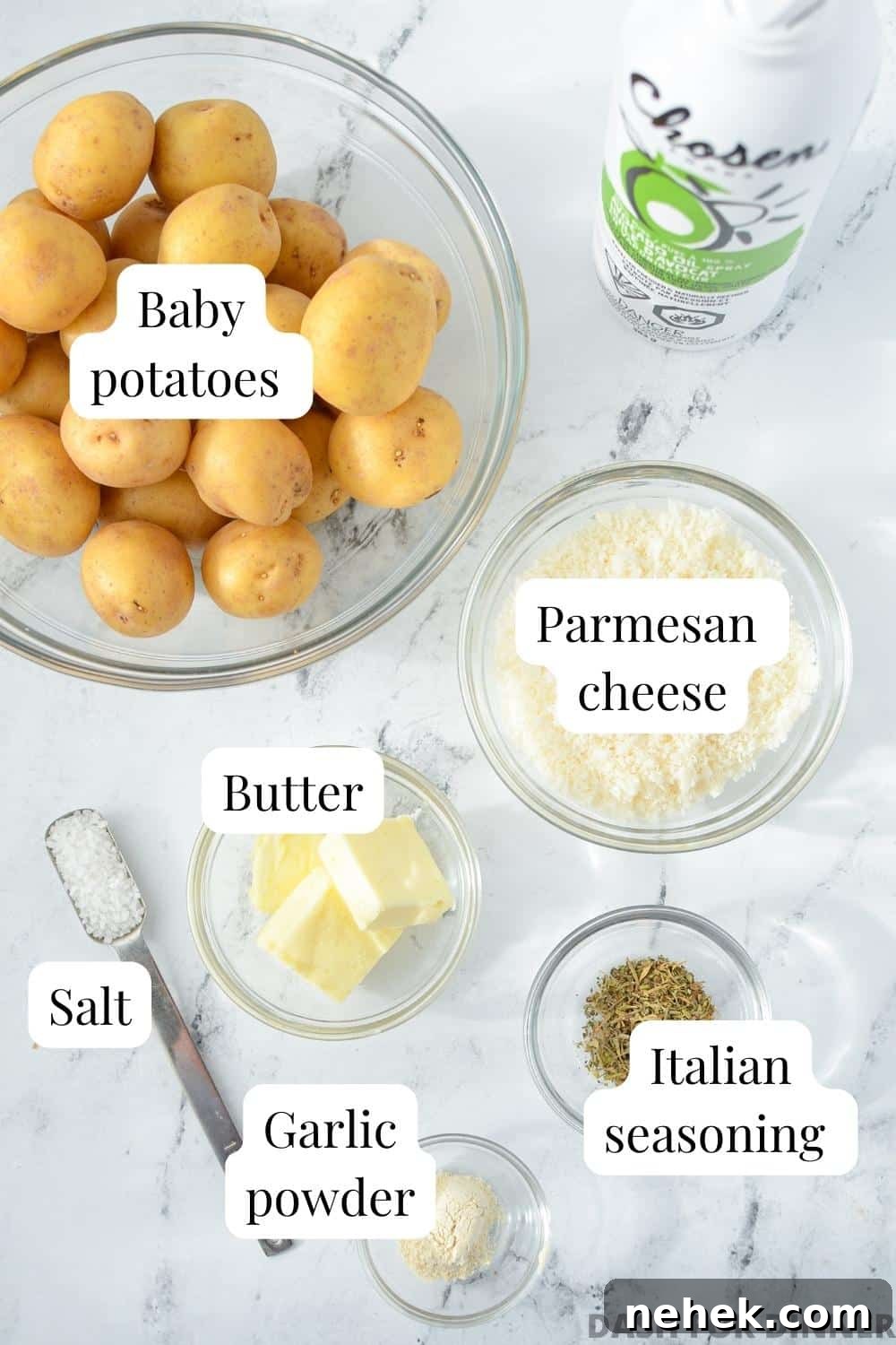 The ingredients needed to make parmesan crusted baby potatoes: baby potatoes, parmesan cheese, butter, Italian seasoning, garlic powder, salt, and cooking spray.