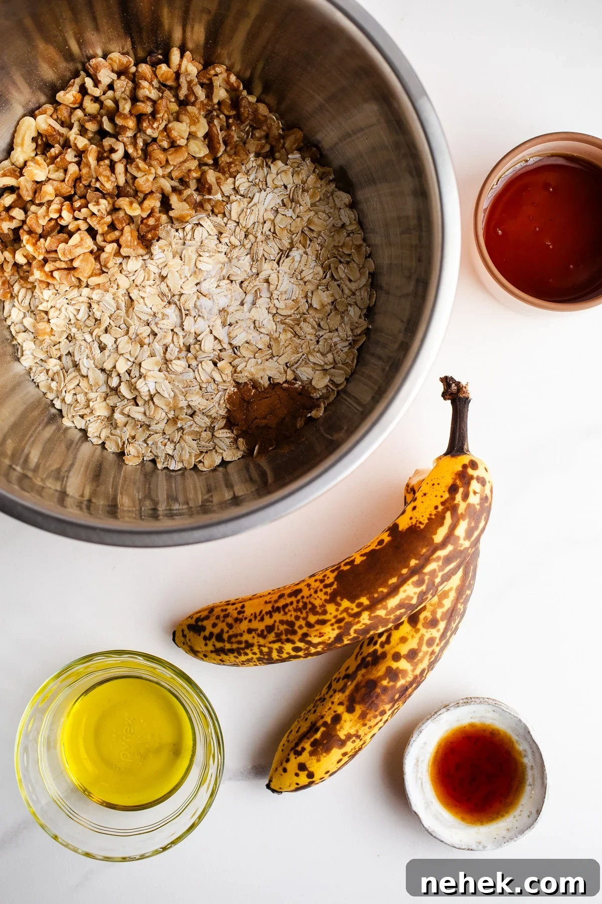 Ingredients in small bowls for granola.