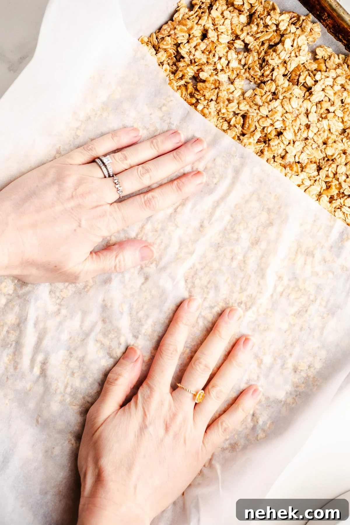 Oats pressed into a baking pan. 