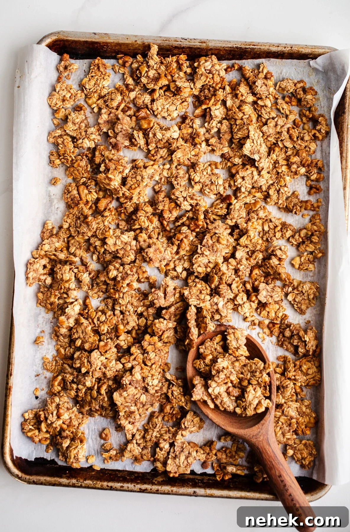 Banana bread granola in a baking pan. 