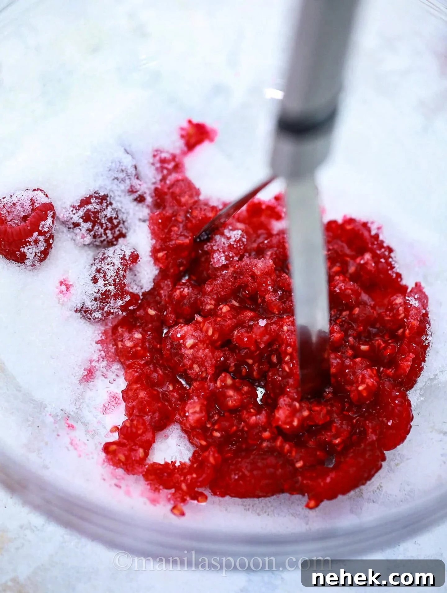 making the raspberry coulis