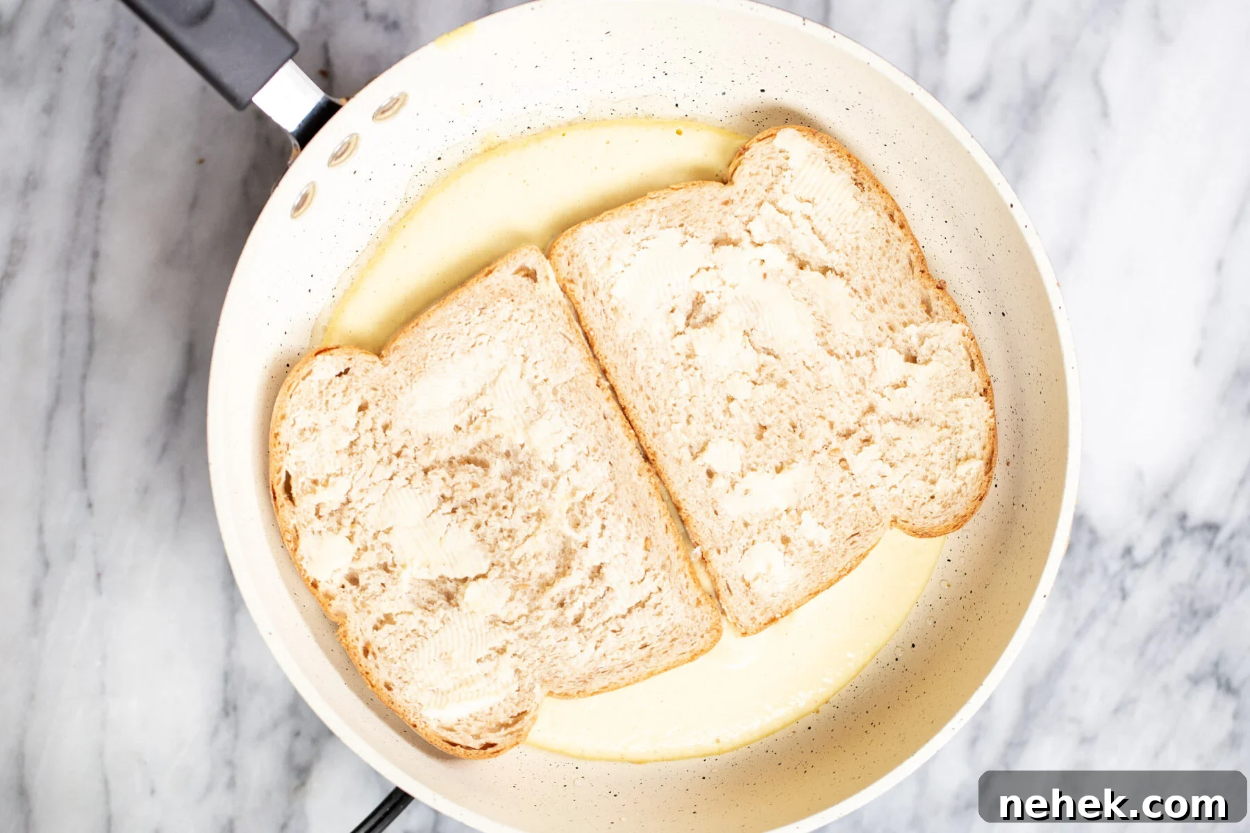 Vegan Moong Egg Sandwich Recipe: Protein-Packed Plant-Based Breakfast 9 fried vegan eggs in a sauteeing pan topped with bread slices