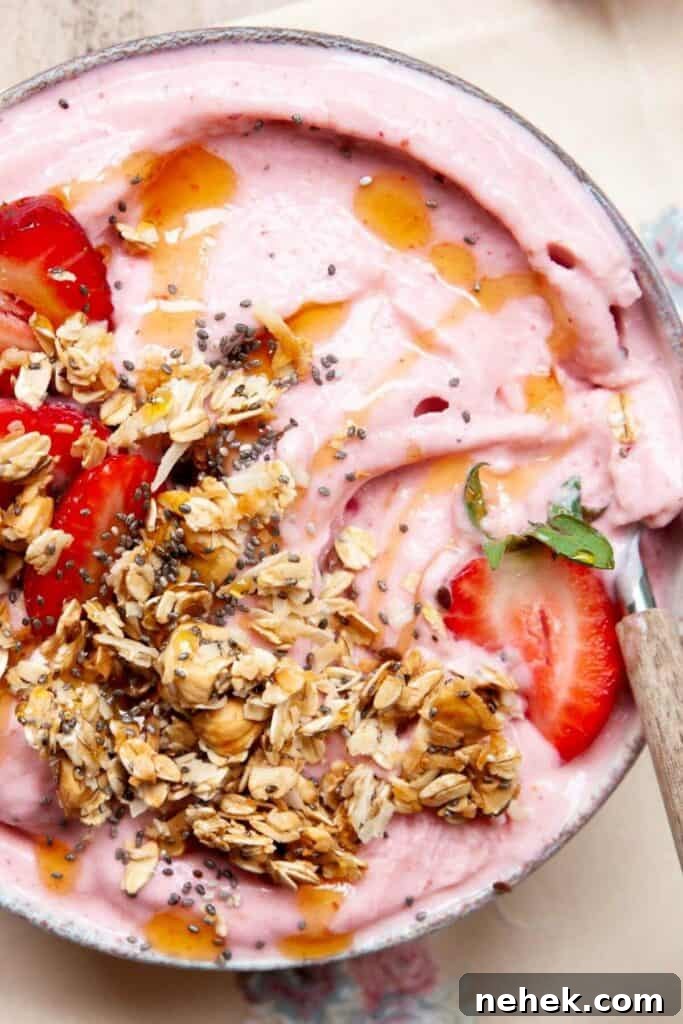 Creamy Strawberry Smoothie Bowl Recipe with Fresh Toppings 9 homemade strawberry smoothie bowl