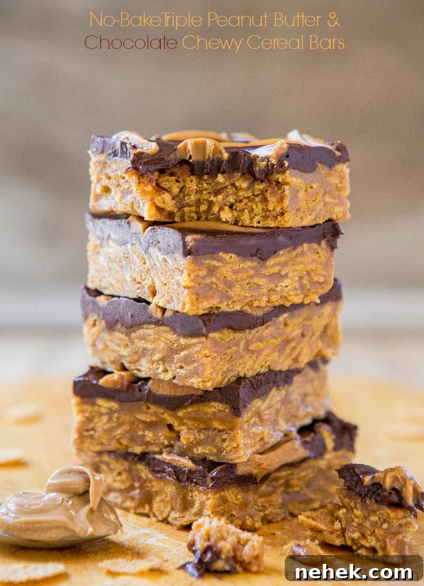 A stack of No-Bake Triple Peanut Butter and Chocolate Chewy Cereal Bars.