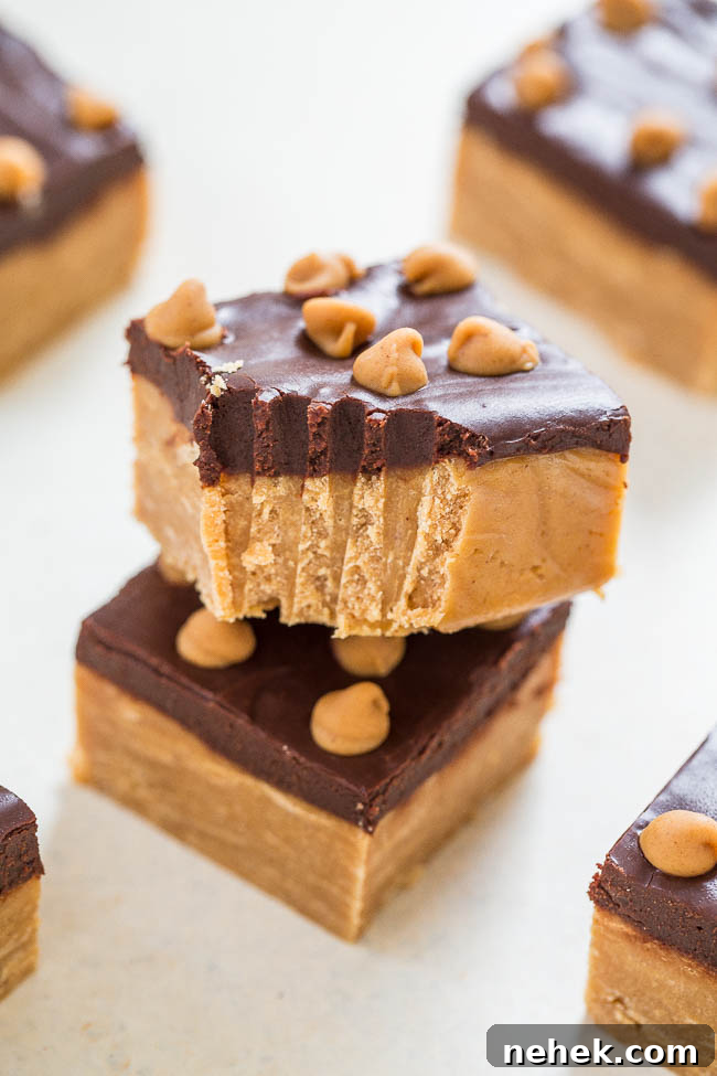 Two pieces of buckeye fudge, one missing a bite.