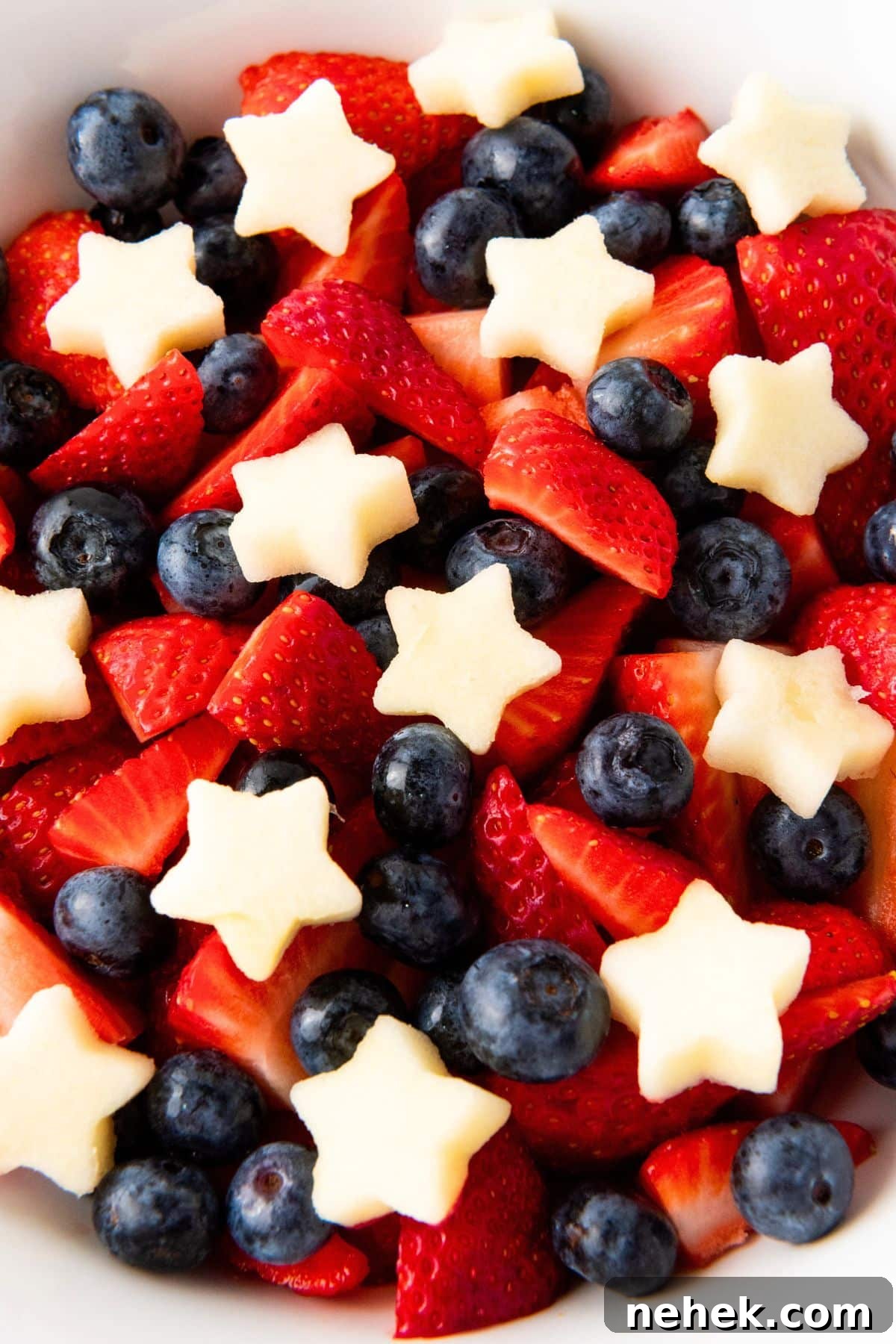 Up close view of red white and blue fruit salad