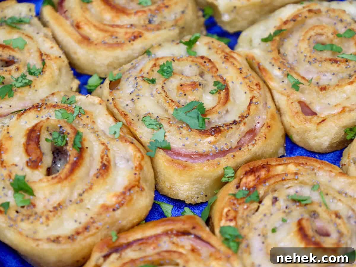 ham and cheese crescent pinwheels in a blue baking dish
