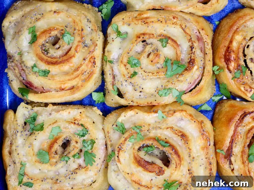 party appetizer pinwheels made with ham and swiss in crescent dough