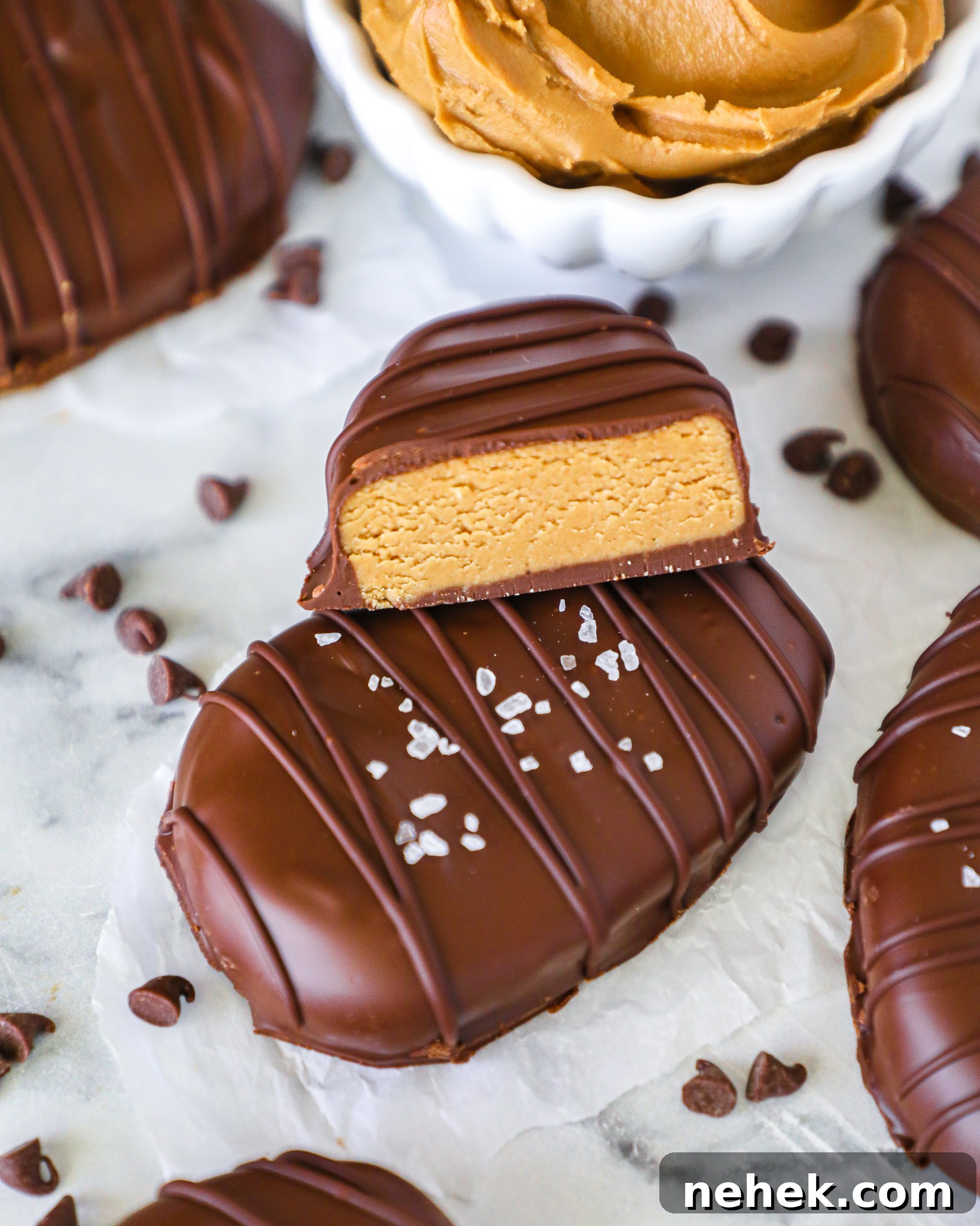 Incredibly easy cookie butter eggs that are only made with 6 ingredients! They're a healthier and fun spin on the classic Reese's eggs!