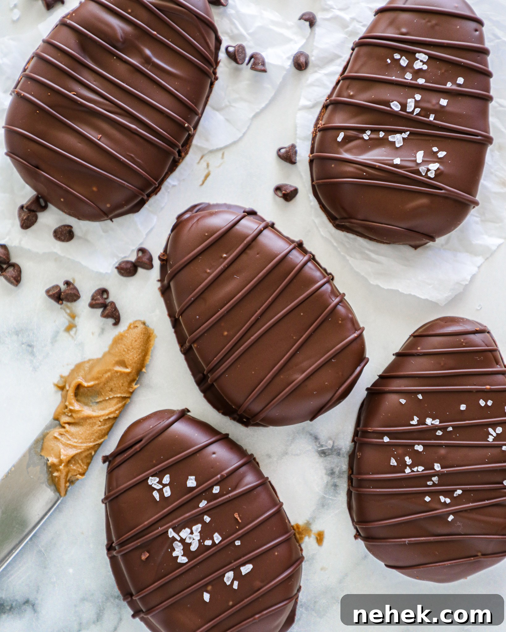 Healthy chocolate covered Easter eggs that you can make at home! They're just like the Reese's eggs you buy at the store but 100 times better!