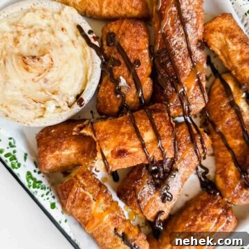 air fried cinnamon sticks drizzled with chocolate and caramel sauce.