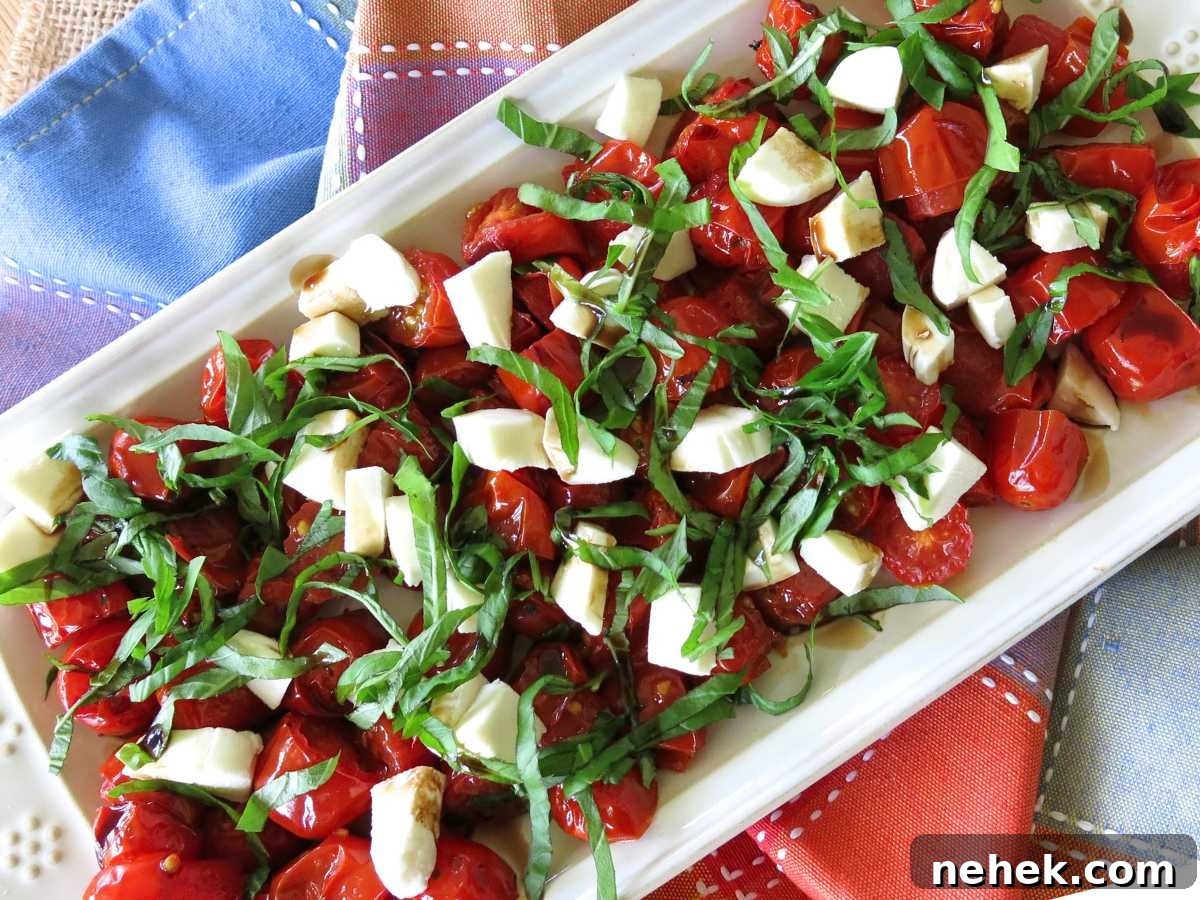 Rectangle platter with grape tomato caprese salad.