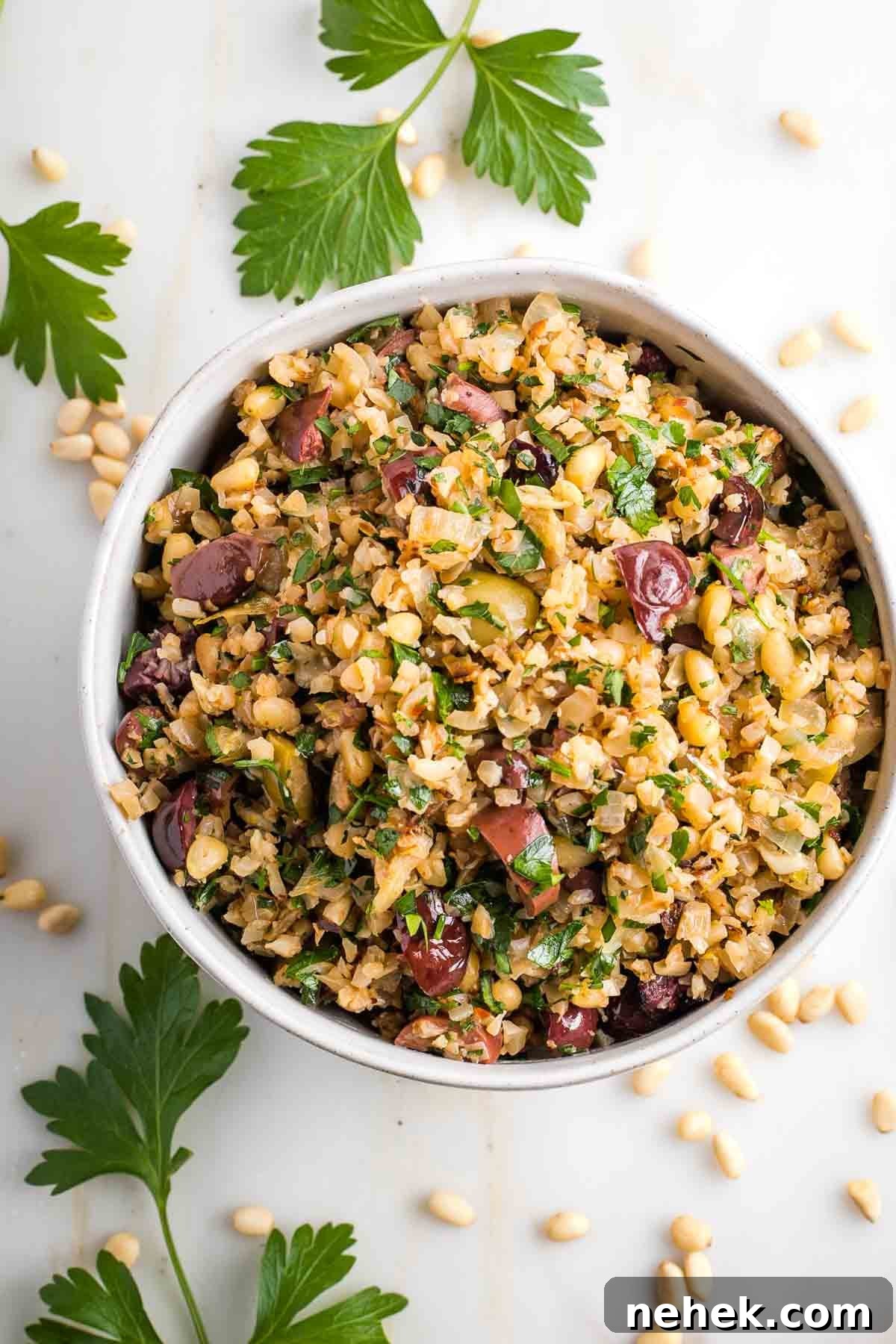 Mediterranean Cauliflower Rice Recipe with Sun‑Dried Tomatoes & Olives 10 Mediterranean cauliflower rice with pine nuts, lemon, fresh herbs and olives.