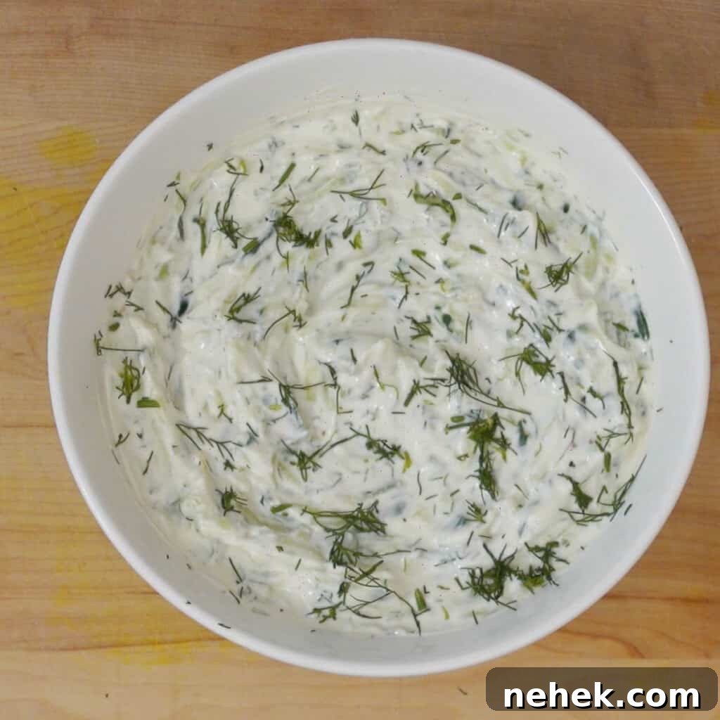 Step 4 mix all ingredients in a bowl and top tzatziki sauce with dill