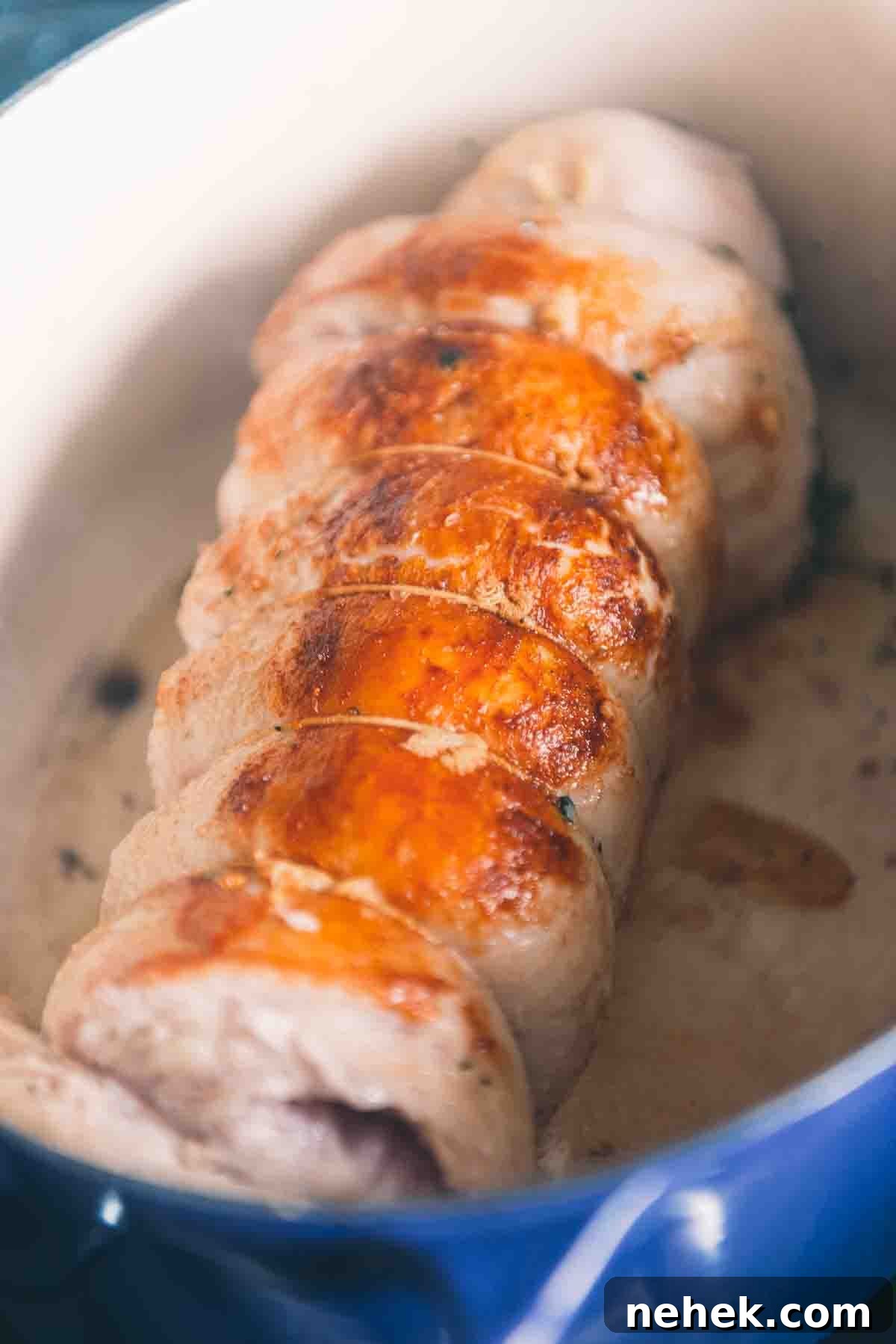 Searing the roast on all sides. 