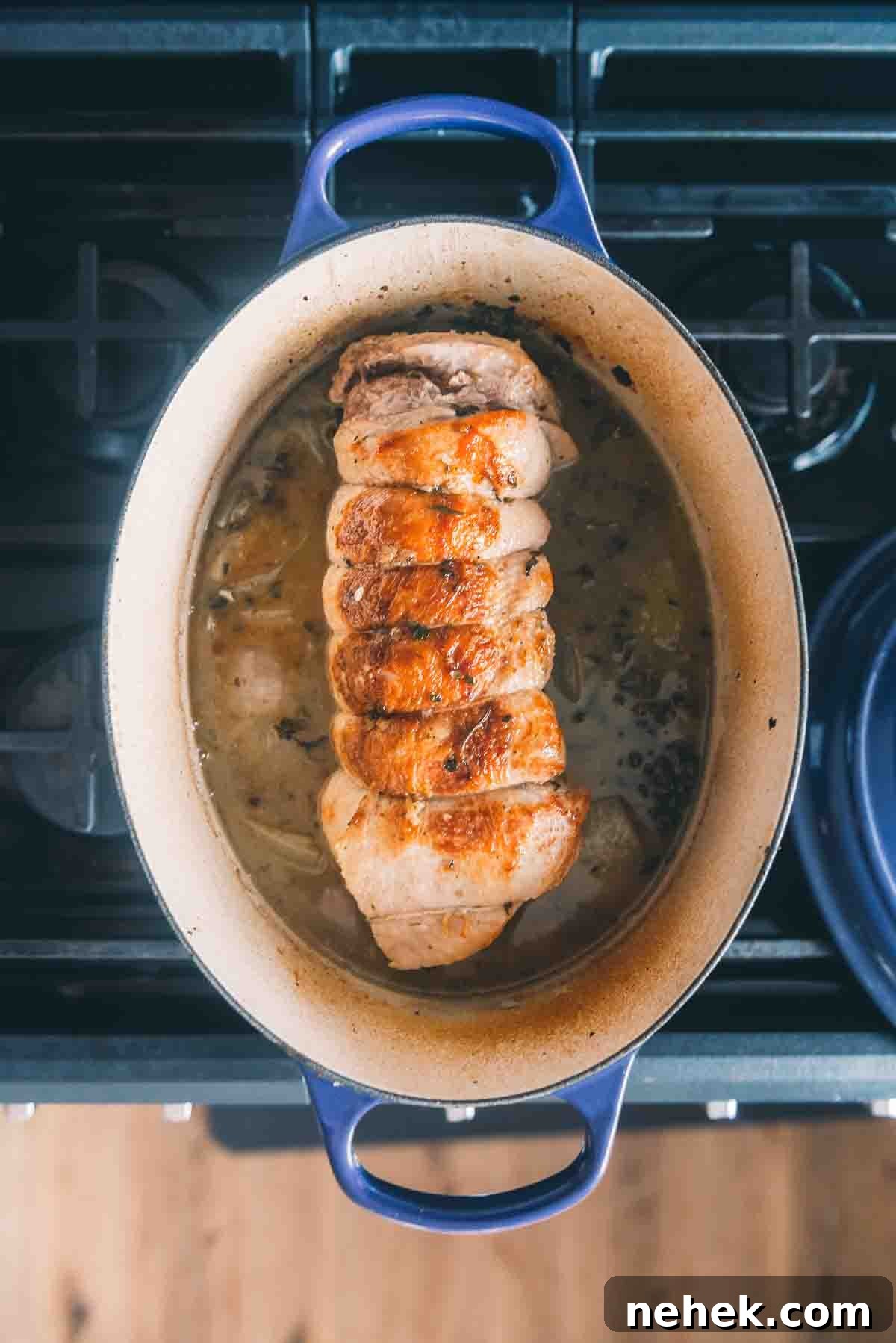 Veal breast from the oven to show light golden color before finishing with a roast. 