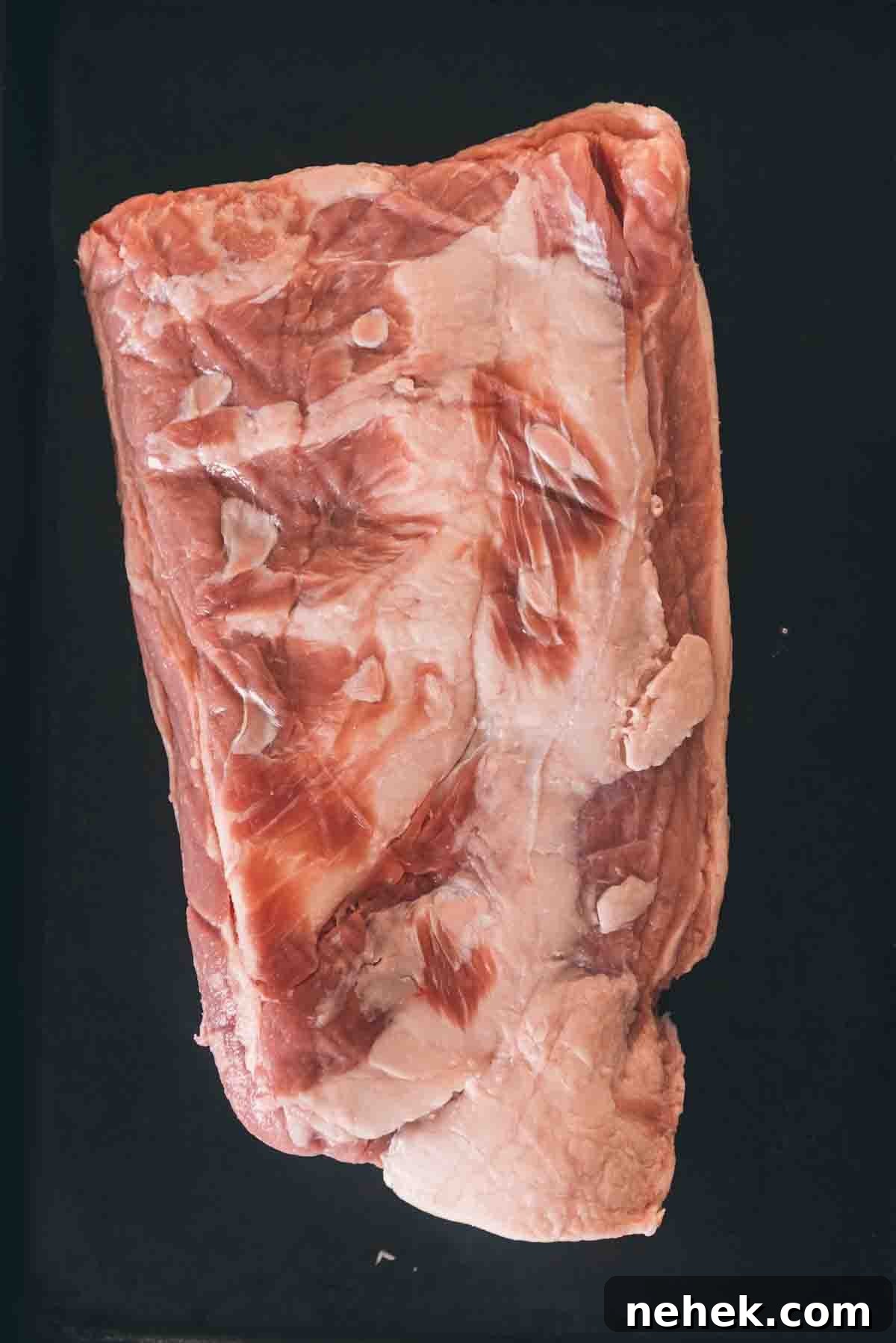 Breast of veal to show the cut, fat side down.