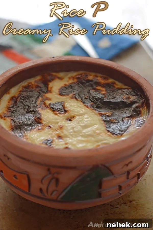 A bowl of food on a table, with Rice pudding