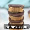 35 High-Protein Vegan Powder Recipes for Smoothies & Snacks 11 Four chocolate peanut butter cups stacked together.