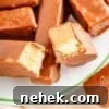 35 High-Protein Vegan Powder Recipes for Smoothies & Snacks 32 Chocolate coated Twix protein bars on a plate.