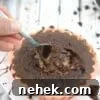 35 High-Protein Vegan Powder Recipes for Smoothies & Snacks 8 Chocolate baked protein oats in a silicone mold with a spoon in it.