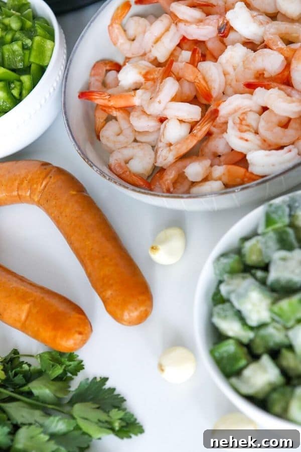 shrimp, kielbasa, and other veggies on a table