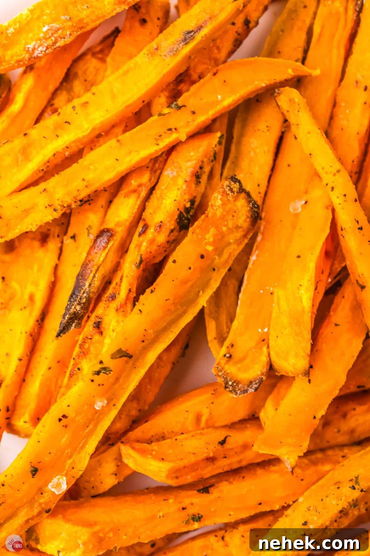 Crispy Oven-Baked Sweet Potato Fries Recipe 11 close up of sweet potato fries