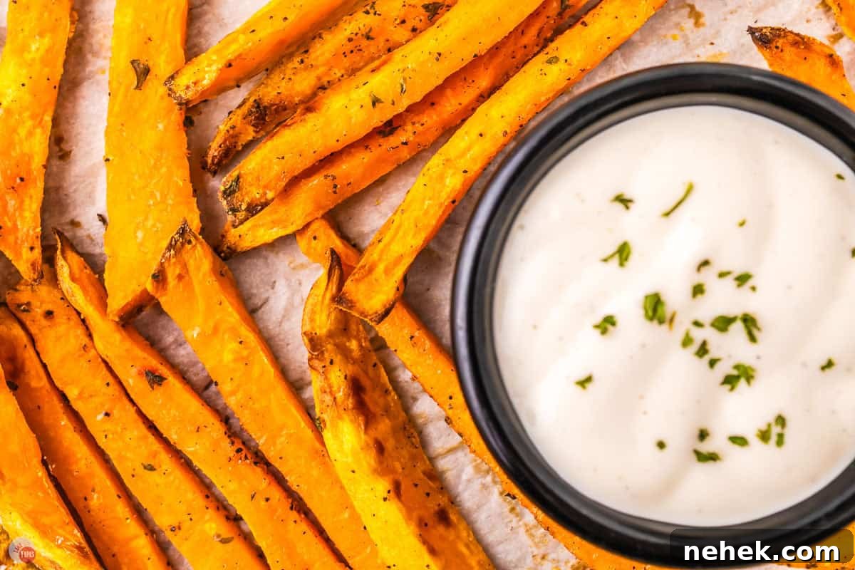 Crispy Oven-Baked Sweet Potato Fries Recipe 10 tray of fries with ranch dressing