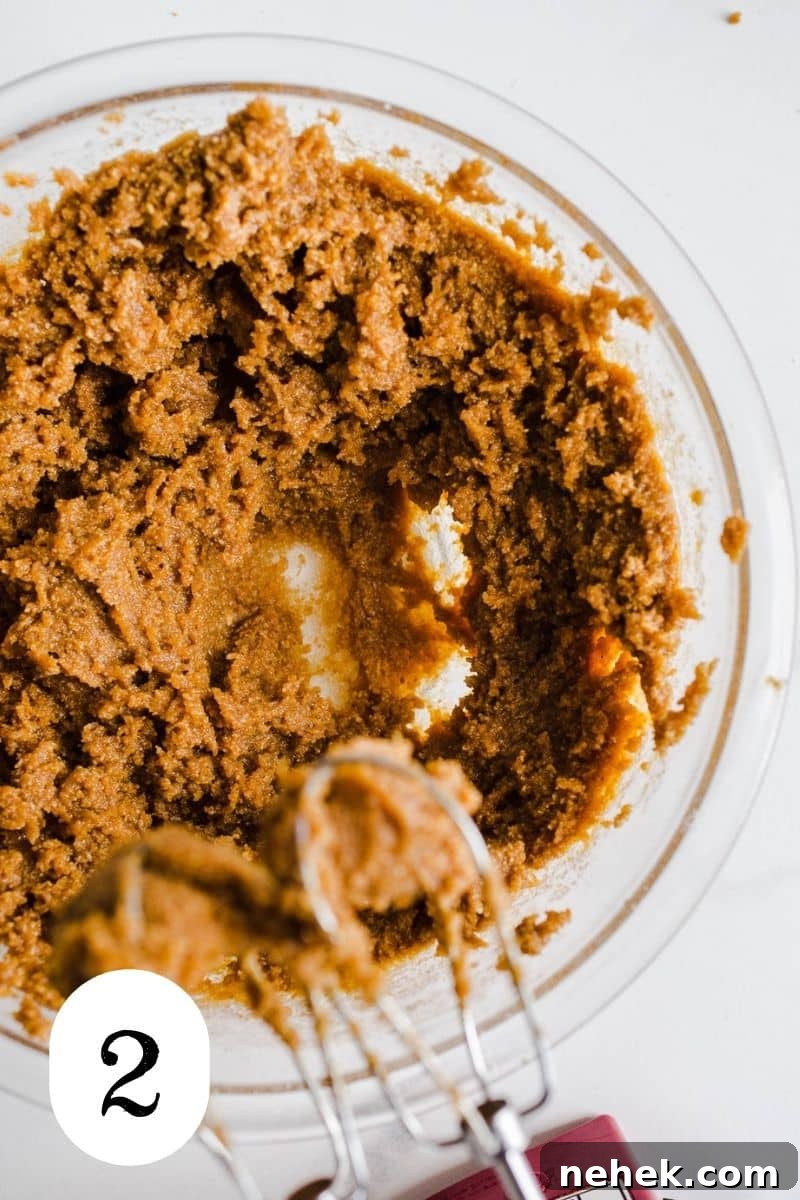 Gluten-Free Pumpkin Chocolate Chip Blondies — Fall Dessert Recipe 5 Pumpkin blondie batter in a bowl.