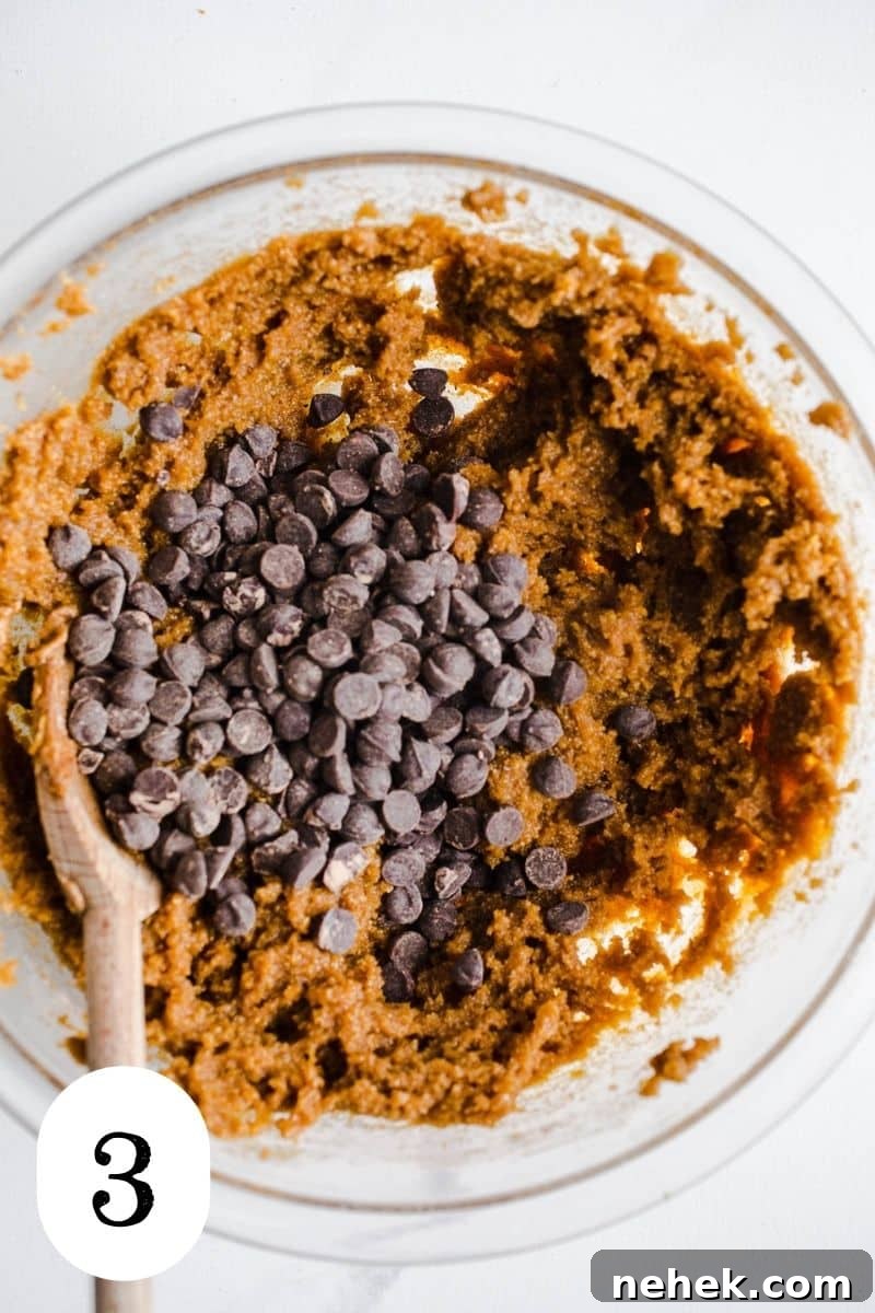 Gluten-Free Pumpkin Chocolate Chip Blondies — Fall Dessert Recipe 6 Chocolate chips in a bowl with blondie batter.
