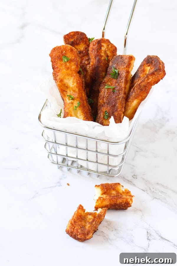 halloumi fries in a wire basket.