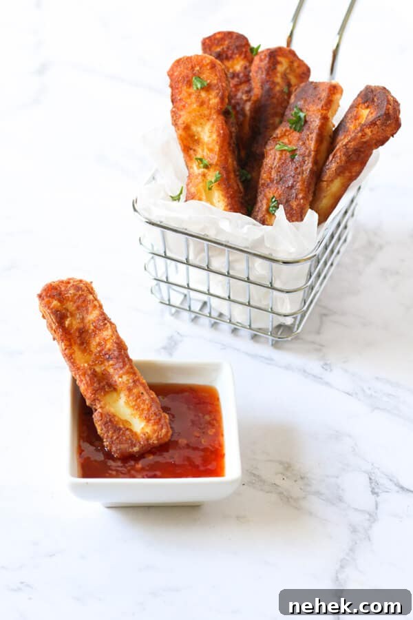 halloumi fries in a wire basket.