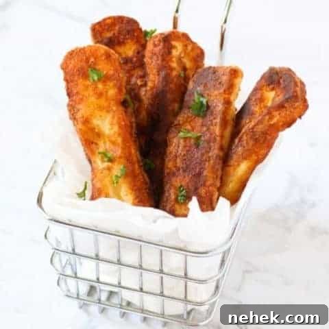 halloumi fries in a wire basket.