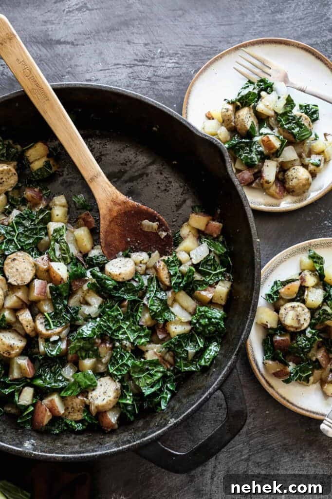 a cast iron skillet and two plates of gluten free sausage, kale and potato skillet